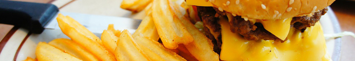Eating Burger Deli at Wow Deli restaurant in Gaithersburg, MD.